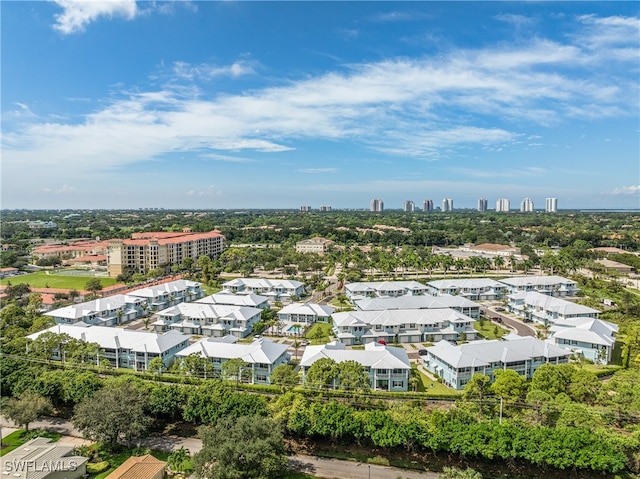 birds eye view of property with a residential view