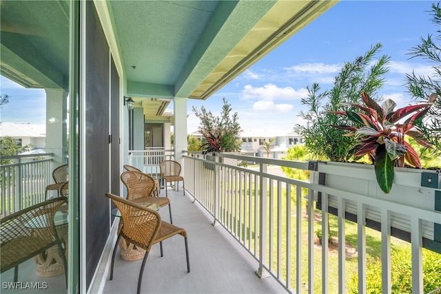 balcony featuring a residential view