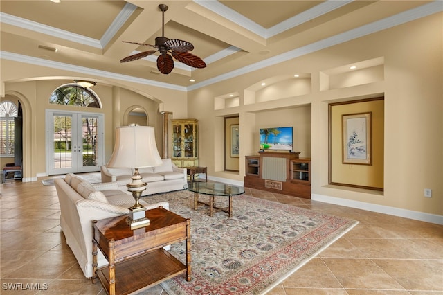 interior space with a high ceiling, baseboards, coffered ceiling, and french doors