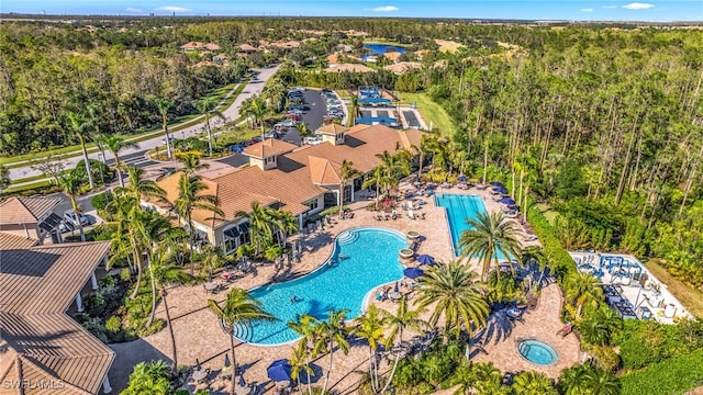 aerial view with a wooded view