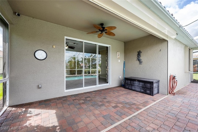 view of patio with ceiling fan