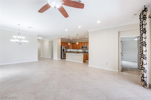 unfurnished living room featuring ceiling fan with notable chandelier, recessed lighting, baseboards, and ornamental molding