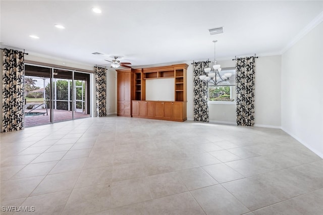 unfurnished living room with visible vents, a healthy amount of sunlight, and crown molding