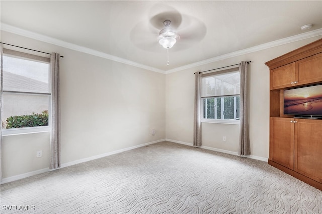 14783 Cranberry Ct, Naples, FL 34114 - carpeted empty room featuring ceiling fan, crown molding, baseboards, and a smoke detector