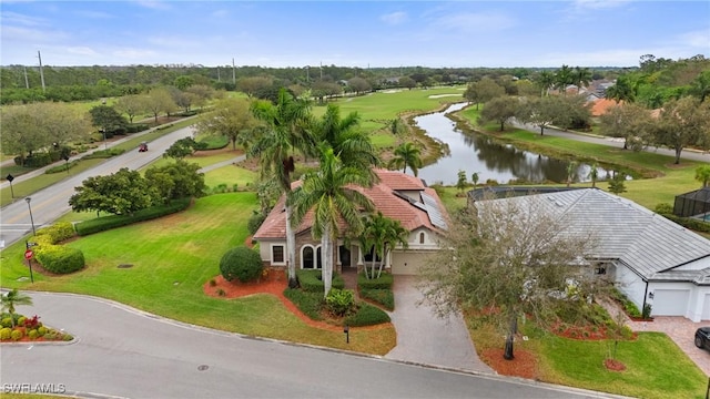 drone / aerial view featuring a water view