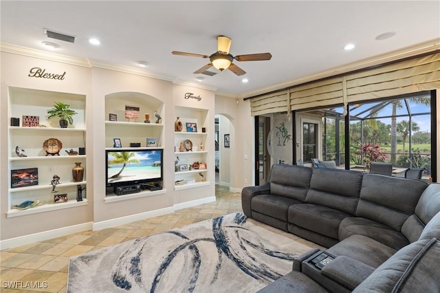 living room with a ceiling fan, baseboards, visible vents, built in features, and ornamental molding