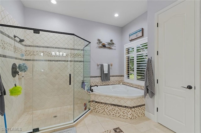 full bathroom featuring recessed lighting, a garden tub, tile patterned flooring, and a stall shower