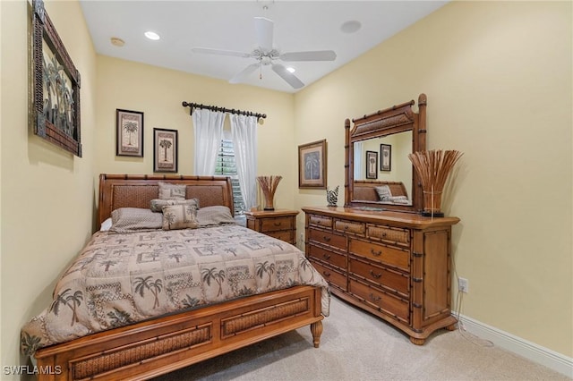 bedroom with light carpet, baseboards, a ceiling fan, and recessed lighting