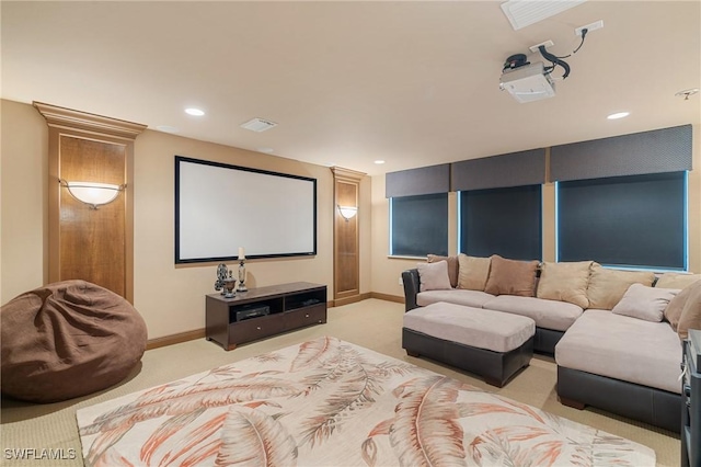 home theater room featuring recessed lighting, light carpet, and baseboards