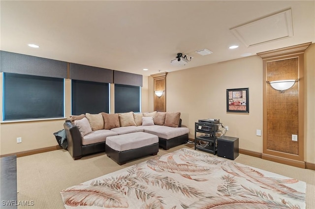 living area featuring attic access, recessed lighting, visible vents, and baseboards