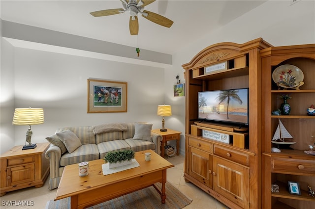 living area with ceiling fan