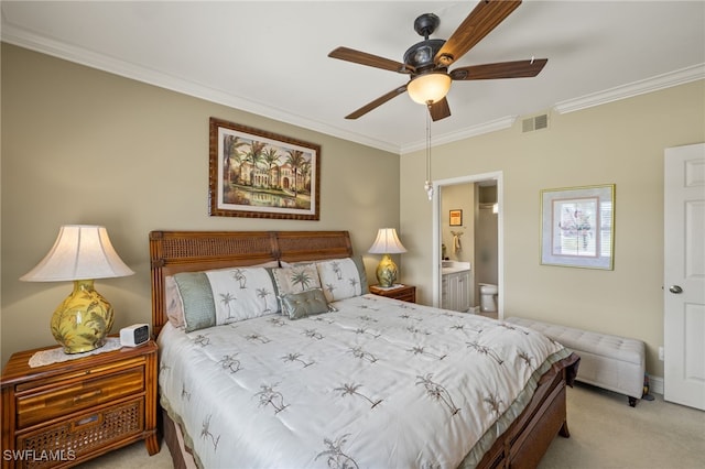 bedroom with ornamental molding, visible vents, and light colored carpet