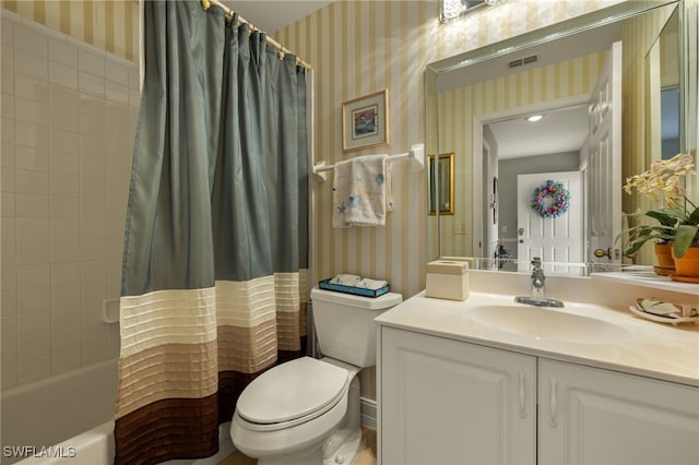 bathroom featuring wallpapered walls, shower / tub combo, visible vents, toilet, and vanity