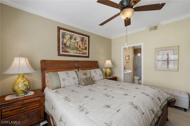 bedroom with ensuite bathroom, carpet floors, visible vents, a ceiling fan, and ornamental molding