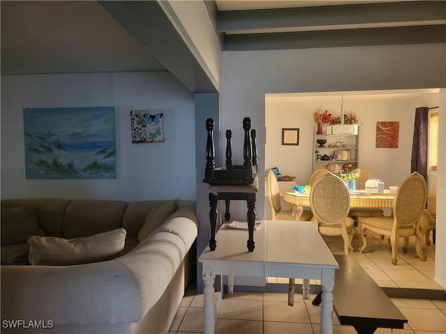 living room with tile patterned floors