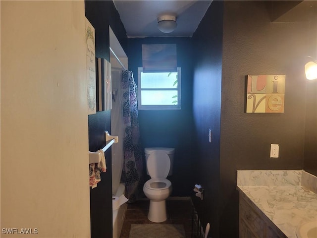 full bath featuring tile patterned flooring, vanity, toilet, and a shower with curtain