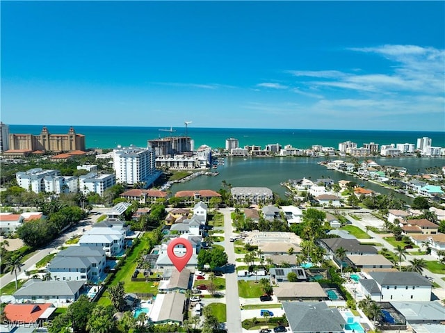 birds eye view of property featuring a water view