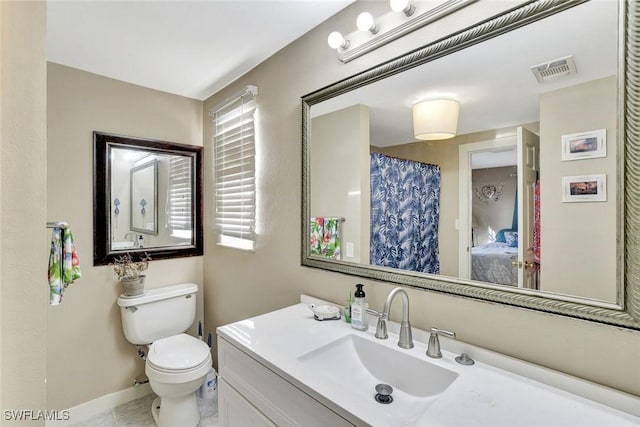 full bathroom with baseboards, visible vents, vanity, and toilet