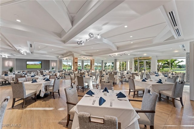 dining space with recessed lighting, beam ceiling, coffered ceiling, and light wood-style flooring