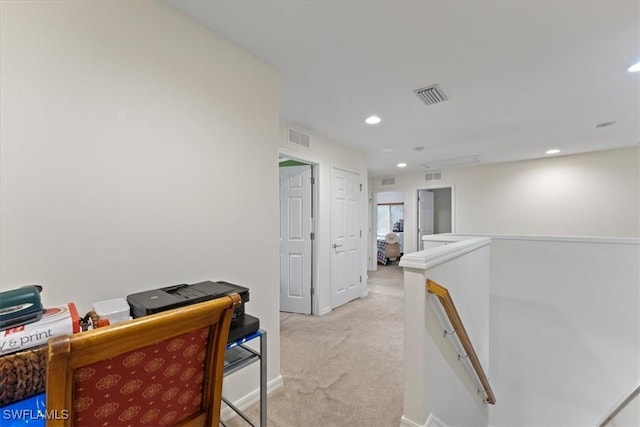 office featuring light carpet, visible vents, and recessed lighting