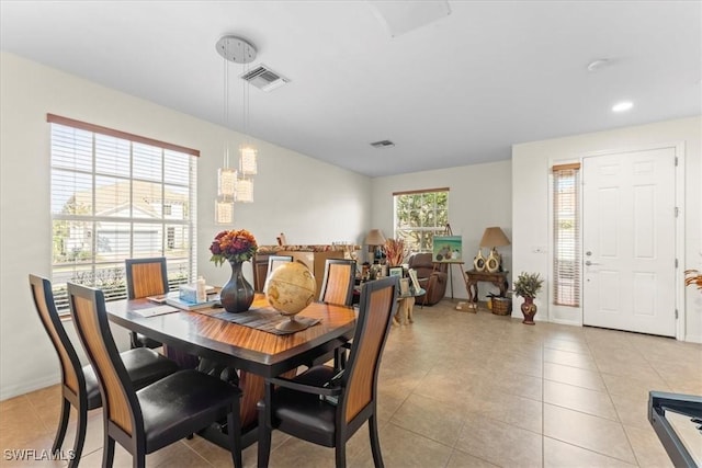 dining area with light tile patterned floors, recessed lighting, visible vents, and baseboards