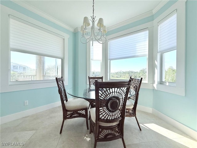 dining space with a chandelier, ornamental molding, a wealth of natural light, and baseboards