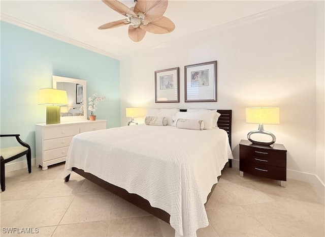 bedroom featuring ceiling fan, crown molding, baseboards, and light tile patterned floors