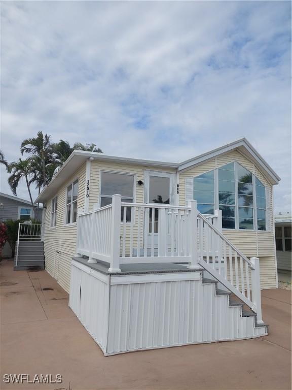 manufactured / mobile home featuring stairs