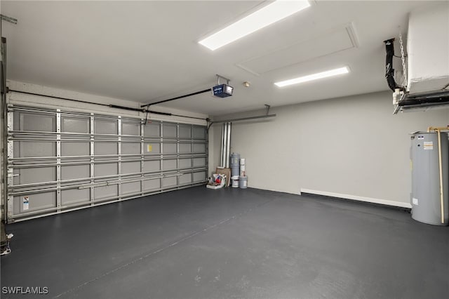 garage with water heater and a garage door opener