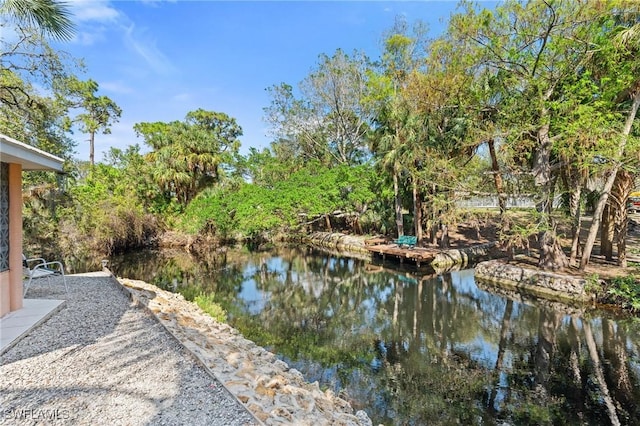 view of yard with a water view