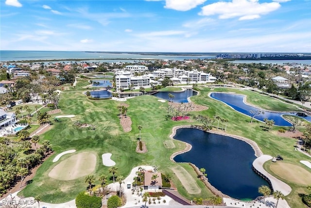 aerial view featuring a water view and golf course view