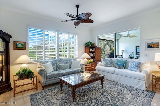 living room featuring ceiling fan, crown molding, and light tile patterned flooring