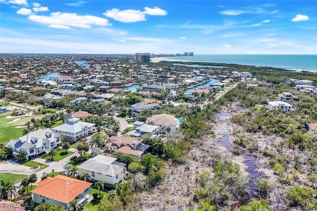 aerial view with a water view and a residential view