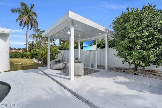 view of patio / terrace featuring fence