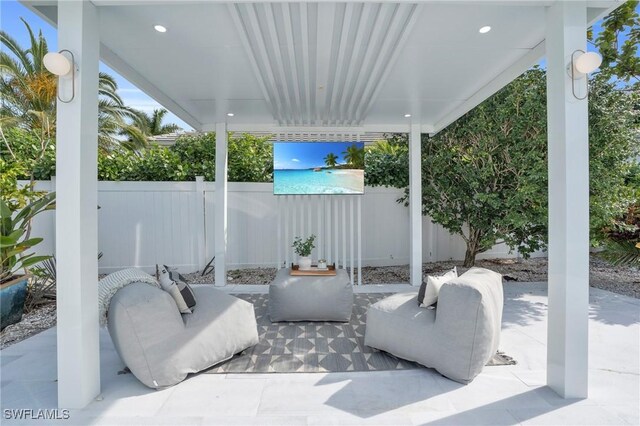 view of patio with fence