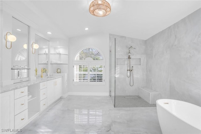 bathroom featuring recessed lighting, tile walls, vanity, a freestanding bath, and walk in shower