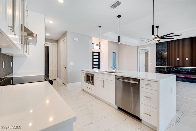 1316 SW 23rd St, Cape Coral, FL 33991 - kitchen featuring stainless steel appliances, light marble finish flooring, a ceiling fan, white cabinets, and recessed lighting