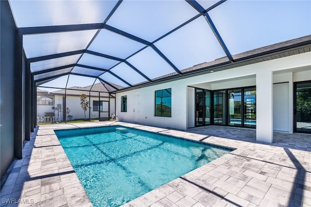 1316 SW 23rd St, Cape Coral, FL 33991 - outdoor pool with a patio and glass enclosure