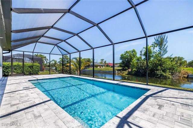 1316 SW 23rd St, Cape Coral, FL 33991 - swimming pool with a water view, a patio, and a lanai