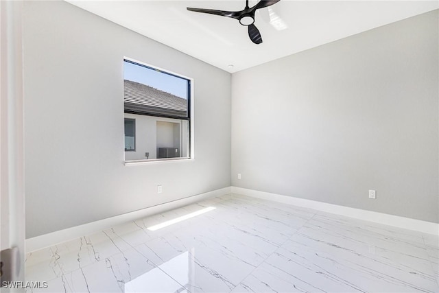 1316 SW 23rd St, Cape Coral, FL 33991 - unfurnished room with marble look tiles, ceiling fan, and baseboards