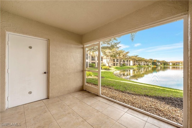 6448 Huntington Lakes Cir Unit 102, Naples, FL 34119 - unfurnished sunroom featuring a water view