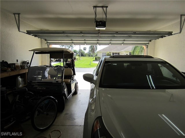 garage featuring a garage door opener