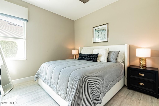 bedroom featuring baseboards