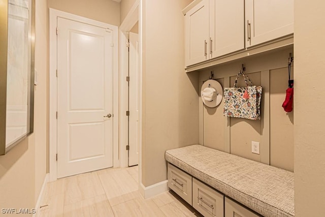 mudroom featuring baseboards