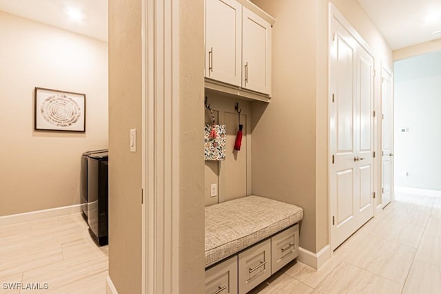 mudroom featuring baseboards