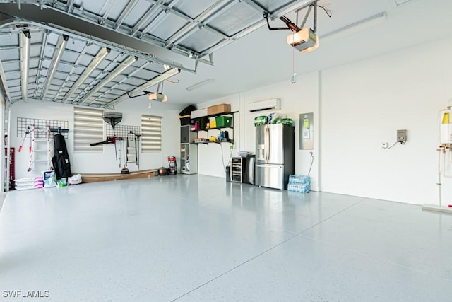 garage featuring stainless steel fridge, electric panel, and a garage door opener