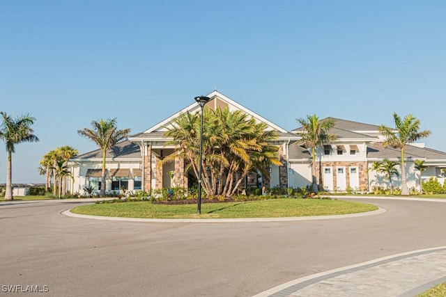 exterior space featuring a front yard