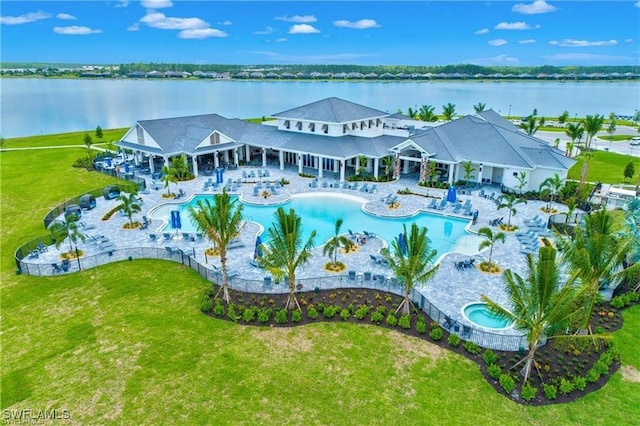 birds eye view of property featuring a water view