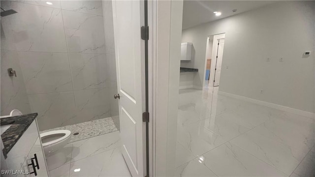 full bathroom with toilet, vanity, baseboards, marble finish floor, and a marble finish shower