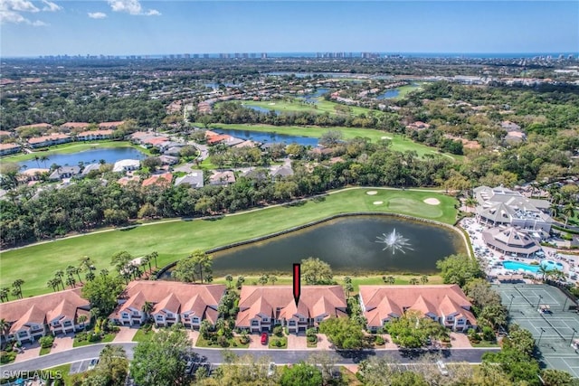 birds eye view of property featuring a residential view, view of golf course, and a water view